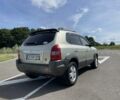 Серый Хендай Туксон, объемом двигателя 2 л и пробегом 246 тыс. км за 6700 $, фото 3 на Automoto.ua