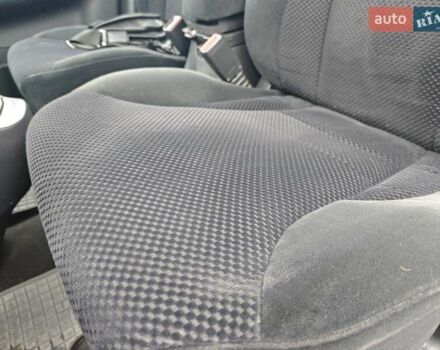 Серый Хендай Туксон, объемом двигателя 1.98 л и пробегом 173 тыс. км за 7450 $, фото 5 на Automoto.ua