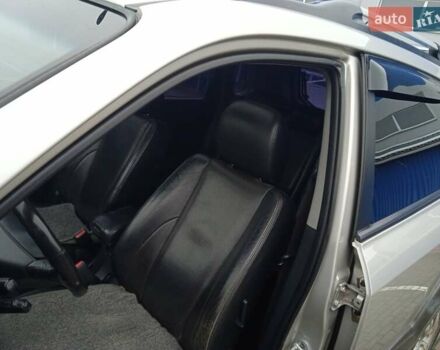 Сірий Хендай Туксон, об'ємом двигуна 1.98 л та пробігом 157 тис. км за 7800 $, фото 32 на Automoto.ua