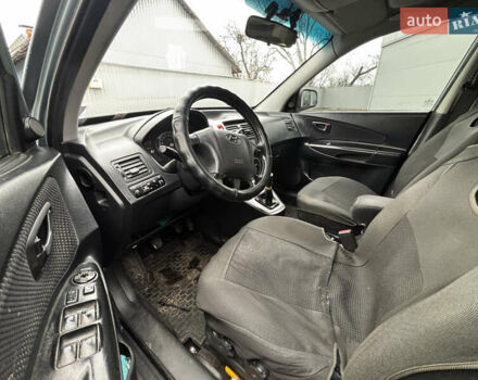 Сірий Хендай Туксон, об'ємом двигуна 2 л та пробігом 255 тис. км за 7600 $, фото 14 на Automoto.ua