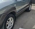 Серый Хендай Туксон, объемом двигателя 1.98 л и пробегом 258 тыс. км за 8500 $, фото 2 на Automoto.ua