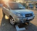 Сірий Хендай Туксон, об'ємом двигуна 2 л та пробігом 177 тис. км за 7400 $, фото 2 на Automoto.ua