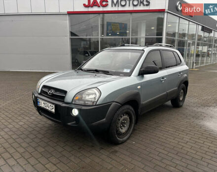 Сірий Хендай Туксон, об'ємом двигуна 2 л та пробігом 255 тис. км за 7600 $, фото 2 на Automoto.ua
