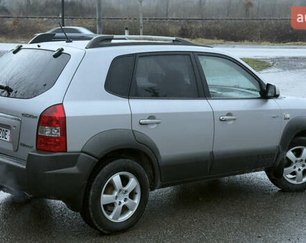 Серый Хендай Туксон, объемом двигателя 2 л и пробегом 222 тыс. км за 7950 $, фото 4 на Automoto.ua