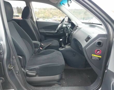 Серый Хендай Туксон, объемом двигателя 2 л и пробегом 245 тыс. км за 4112 $, фото 6 на Automoto.ua