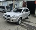 Серый Хендай Туксон, объемом двигателя 2 л и пробегом 330 тыс. км за 4000 $, фото 1 на Automoto.ua