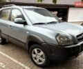 Серый Хендай Туксон, объемом двигателя 1.98 л и пробегом 218 тыс. км за 7900 $, фото 1 на Automoto.ua