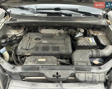 Серый Хендай Туксон, объемом двигателя 1.98 л и пробегом 340 тыс. км за 3999 $, фото 10 на Automoto.ua