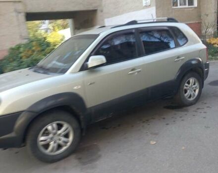 Сірий Хендай Туксон, об'ємом двигуна 2 л та пробігом 151 тис. км за 7700 $, фото 5 на Automoto.ua