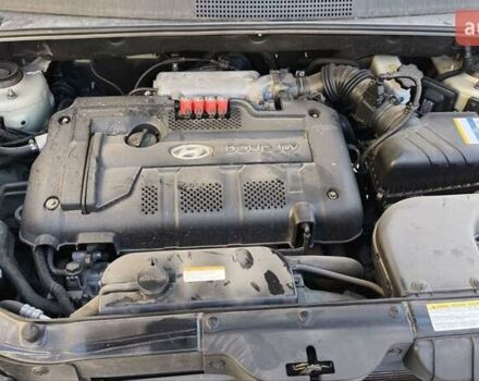 Серый Хендай Туксон, объемом двигателя 1.98 л и пробегом 193 тыс. км за 8400 $, фото 26 на Automoto.ua