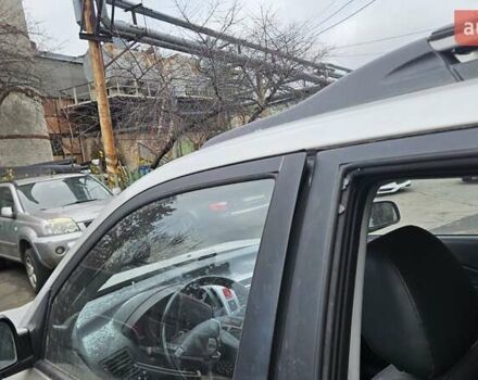 Серый Хендай Туксон, объемом двигателя 2 л и пробегом 330 тыс. км за 4000 $, фото 22 на Automoto.ua