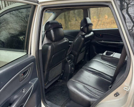 Серый Хендай Туксон, объемом двигателя 1.98 л и пробегом 269 тыс. км за 7100 $, фото 28 на Automoto.ua