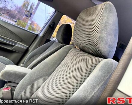 Сірий Хендай Туксон, об'ємом двигуна 2 л та пробігом 316 тис. км за 6780 $, фото 6 на Automoto.ua