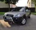 Сірий Хендай Туксон, об'ємом двигуна 1.98 л та пробігом 175 тис. км за 9000 $, фото 1 на Automoto.ua