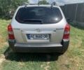 Серый Хендай Туксон, объемом двигателя 2 л и пробегом 228 тыс. км за 7400 $, фото 5 на Automoto.ua