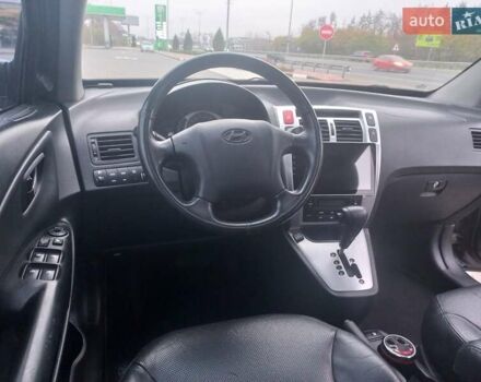 Сірий Хендай Туксон, об'ємом двигуна 2 л та пробігом 190 тис. км за 8600 $, фото 56 на Automoto.ua