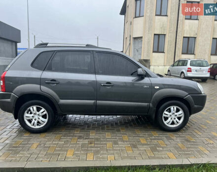 Серый Хендай Туксон, объемом двигателя 1.98 л и пробегом 242 тыс. км за 7499 $, фото 9 на Automoto.ua