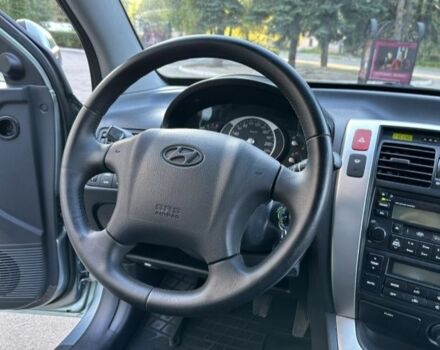 Серый Хендай Туксон, объемом двигателя 2 л и пробегом 110 тыс. км за 11900 $, фото 7 на Automoto.ua