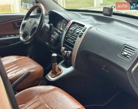 Серый Хендай Туксон, объемом двигателя 2 л и пробегом 271 тыс. км за 7400 $, фото 33 на Automoto.ua