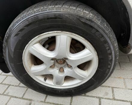 Серый Хендай Туксон, объемом двигателя 2 л и пробегом 175 тыс. км за 3400 $, фото 13 на Automoto.ua