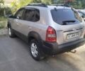 Сірий Хендай Туксон, об'ємом двигуна 1.98 л та пробігом 305 тис. км за 8700 $, фото 1 на Automoto.ua