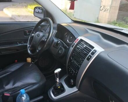 Сірий Хендай Туксон, об'ємом двигуна 1.98 л та пробігом 305 тис. км за 8700 $, фото 4 на Automoto.ua