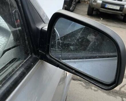 Серый Хендай Туксон, объемом двигателя 2 л и пробегом 330 тыс. км за 4000 $, фото 5 на Automoto.ua