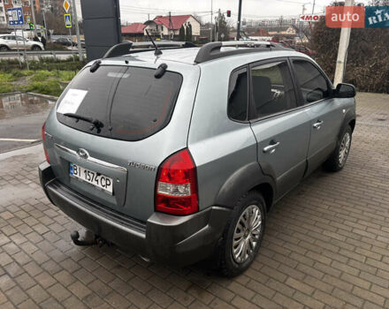 Сірий Хендай Туксон, об'ємом двигуна 2 л та пробігом 255 тис. км за 7600 $, фото 8 на Automoto.ua