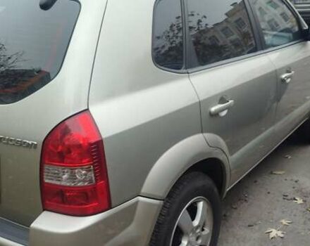 Серый Хендай Туксон, объемом двигателя 1.98 л и пробегом 169 тыс. км за 7500 $, фото 14 на Automoto.ua