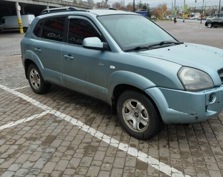 Серый Хендай Туксон, объемом двигателя 2 л и пробегом 2 тыс. км за 6800 $, фото 2 на Automoto.ua
