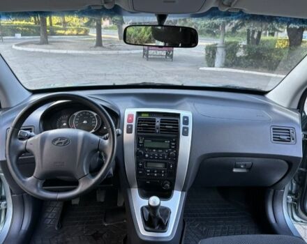 Серый Хендай Туксон, объемом двигателя 2 л и пробегом 110 тыс. км за 10500 $, фото 8 на Automoto.ua