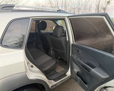 Хендай Туксон 2007 у Ахтырке на Automoto.ua Сірий Хендай Туксон, об'ємом двигуна 2 л та пробігом 192 тис. км за 6950 $, фото 10 на Automoto.ua