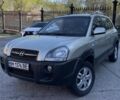 Серый Хендай Туксон, объемом двигателя 1.98 л и пробегом 211 тыс. км за 7000 $, фото 1 на Automoto.ua