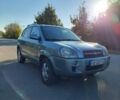 Сірий Хендай Туксон, об'ємом двигуна 2 л та пробігом 225 тис. км за 7800 $, фото 9 на Automoto.ua