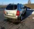 Сірий Хендай Туксон, об'ємом двигуна 2 л та пробігом 177 тис. км за 7900 $, фото 6 на Automoto.ua