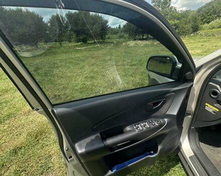 Сірий Хендай Туксон, об'ємом двигуна 1.98 л та пробігом 277 тис. км за 7650 $, фото 16 на Automoto.ua