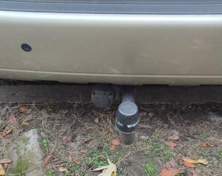 Серый Хендай Туксон, объемом двигателя 1.98 л и пробегом 169 тыс. км за 7500 $, фото 7 на Automoto.ua