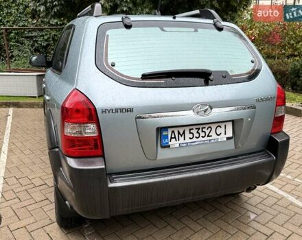 Серый Хендай Туксон, объемом двигателя 1.98 л и пробегом 218 тыс. км за 7900 $, фото 7 на Automoto.ua