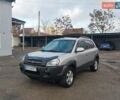 Серый Хендай Туксон, объемом двигателя 2 л и пробегом 168 тыс. км за 7000 $, фото 3 на Automoto.ua