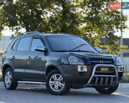 Серый Хендай Туксон, объемом двигателя 1.98 л и пробегом 282 тыс. км за 8350 $, фото 5 на Automoto.ua