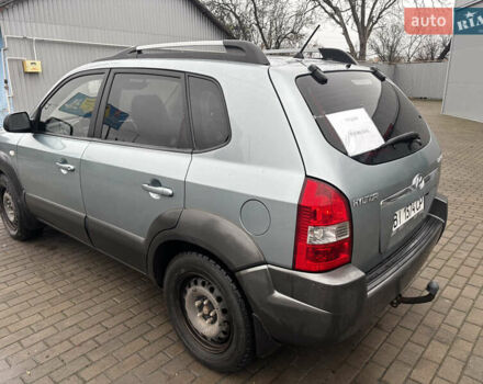 Сірий Хендай Туксон, об'ємом двигуна 2 л та пробігом 255 тис. км за 7600 $, фото 6 на Automoto.ua