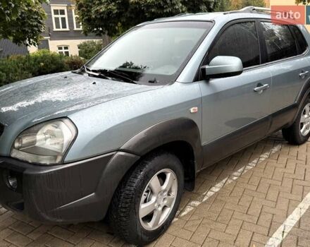 Серый Хендай Туксон, объемом двигателя 1.98 л и пробегом 218 тыс. км за 7900 $, фото 4 на Automoto.ua