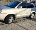 Серый Хендай Туксон, объемом двигателя 1.98 л и пробегом 193 тыс. км за 8800 $, фото 4 на Automoto.ua