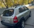 Сірий Хендай Туксон, об'ємом двигуна 2 л та пробігом 151 тис. км за 7700 $, фото 4 на Automoto.ua