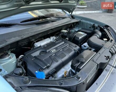 Серый Хендай Туксон, объемом двигателя 2 л и пробегом 110 тыс. км за 10200 $, фото 26 на Automoto.ua