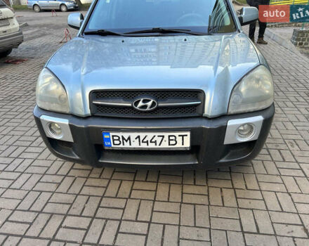 Серый Хендай Туксон, объемом двигателя 1.98 л и пробегом 269 тыс. км за 7500 $, фото 14 на Automoto.ua