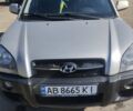 Серый Хендай Туксон, объемом двигателя 1.98 л и пробегом 120 тыс. км за 7800 $, фото 1 на Automoto.ua