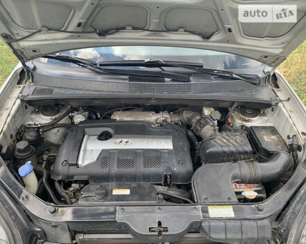 Сірий Хендай Туксон, об'ємом двигуна 1.98 л та пробігом 227 тис. км за 7500 $, фото 9 на Automoto.ua
