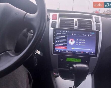 Сірий Хендай Туксон, об'ємом двигуна 2 л та пробігом 190 тис. км за 8600 $, фото 19 на Automoto.ua