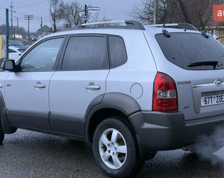 Серый Хендай Туксон, объемом двигателя 2 л и пробегом 222 тыс. км за 7950 $, фото 6 на Automoto.ua